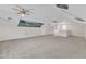Large bonus room with neutral carpet, vaulted ceilings, and ceiling fans at 102 Switchback St, Knightdale, NC 27545