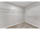 Walk-in closet with built-in shelving, perfect for storage and organization at 102 Switchback St, Knightdale, NC 27545