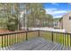 Backyard view of private wooden deck offering outdoor living space at 102 Switchback St, Knightdale, NC 27545