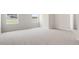 Bedroom with neutral carpet and views of the outdoors at 104 Pisgah St, Sanford, NC 27330
