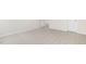 Bright bedroom with neutral walls, gray carpet, and crisp white doors and trim at 104 Pisgah St, Sanford, NC 27330