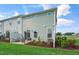 Private patio with stylish outdoor furniture, perfect for relaxing, in a landscaped backyard at 104 Siebold St, Garner, NC 27529