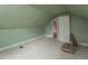 Attic with low sloping ceilings. Good storage and bonus room potential at 105 John St, Louisburg, NC 27549