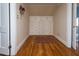 Attic space featuring built-in storage and hardwood flooring at 105 John St, Louisburg, NC 27549
