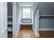 Attic nook featuring a window seat and hardwood flooring at 105 John St, Louisburg, NC 27549