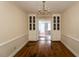 Elegant dining room with hardwood floors and built-in cabinets that offers plenty of storage at 105 John St, Louisburg, NC 27549