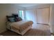 Bedroom featuring natural light, wood floors and large closets at 12 Melstone Turn, Durham, NC 27707
