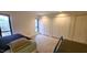 Bright bedroom featuring light wood flooring, large window, and spacious closets at 12 Melstone Turn, Durham, NC 27707