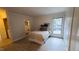 Cozy bedroom with window view to the outside at 12 Melstone Turn, Durham, NC 27707