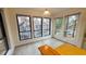 Charming breakfast nook area with bright, natural light and windows that showcase neighborhood views at 12 Melstone Turn, Durham, NC 27707
