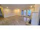 Spacious living room with fireplace and sliding glass door access to a porch with neighborhood views at 12 Melstone Turn, Durham, NC 27707