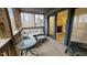 Relaxing outdoor porch with comfortable seating, looking out to the trees at 12 Melstone Turn, Durham, NC 27707