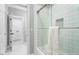 Contemporary bathroom featuring white subway tile in shower with glass door and modern fixtures at 1321 Colonial Club Rd, Wake Forest, NC 27587