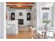 Spacious living room features hardwood floors, fireplace and wooden beams at 1321 Colonial Club Rd, Wake Forest, NC 27587