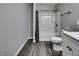 Bright bathroom featuring a shower and tub at 1323 Colon Rd, Sanford, NC 27330