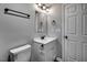 Bathroom featuring neutral walls, tile floors, a vanity and updated fixtures at 1323 Colon Rd, Sanford, NC 27330