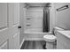 Bathroom featuring neutral walls, tile floors, and a tub shower at 1323 Colon Rd, Sanford, NC 27330