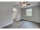 A bedroom featuring a window, closet and gray walls at 1323 Colon Rd, Sanford, NC 27330