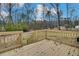 New wooden deck overlooking a spacious wooded backyard at 1323 Colon Rd, Sanford, NC 27330