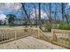 Spacious wooden deck with railing provides a great view of the property at 1323 Colon Rd, Sanford, NC 27330