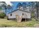 Charming home featuring a new wooden deck, grey siding, and a well-maintained lawn at 1323 Colon Rd, Sanford, NC 27330