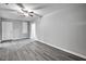 Spacious living room offers contemporary flooring, neutral colors, ceiling fan, and ample space at 1323 Colon Rd, Sanford, NC 27330