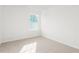 The Bedroom offers neutral walls, light carpet, and is well-lit with a view of the exterior at 279 Canopy Dr, Graham, NC 27253