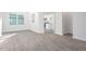 Spacious living room with luxury vinyl flooring and natural light at 279 Canopy Dr, Graham, NC 27253