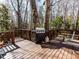 Inviting back deck perfect for outdoor grilling and entertaining in a natural wooded setting at 3005 Woodgreen Dr, Raleigh, NC 27607
