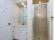 Bathroom with vanity, mirror, enclosed shower, and neutral decor at 3005 Woodgreen Dr, Raleigh, NC 27607