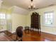 Spacious bedroom features hardwood floors, a vintage armoire, and ample natural light at 3005 Woodgreen Dr, Raleigh, NC 27607