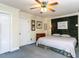 Bedroom featuring a full bed, ceiling fan, and decor at 3005 Woodgreen Dr, Raleigh, NC 27607