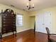 Bedroom features hardwood floors, chest of drawers, closet and natural light at 3005 Woodgreen Dr, Raleigh, NC 27607