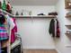 Walk-in closet features ample shelving, clothing racks, and carpet flooring at 3005 Woodgreen Dr, Raleigh, NC 27607