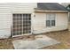 View of the back of the house featuring a sliding glass door, window, and a patio at 3323 Nantuckett Ave, Durham, NC 27703