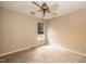 A bright bedroom with carpeting, ceiling fan, and a window for natural light at 3323 Nantuckett Ave, Durham, NC 27703