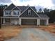 Inviting two-story home with a two-car garage, showcasing a design with great curb appeal at 358 Coats Ridge Dr, Benson, NC 27504