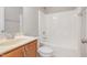 Standard bathroom featuring a vanity, toilet, and shower-tub combo, providing essential amenities at 3910 Wedonia Dr, Cary, NC 27519