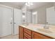 Bathroom featuring a double sink vanity with a large mirror, offering both style and functionality at 3910 Wedonia Dr, Cary, NC 27519