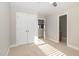 Neutral-toned bedroom with a large closet and natural lighting at 3910 Wedonia Dr, Cary, NC 27519