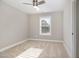 A simple carpeted bedroom with a window and neutral paint at 3910 Wedonia Dr, Cary, NC 27519