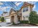 Beautiful two-story home boasting a stone facade, well-maintained landscaping, and an inviting front entrance at 3910 Wedonia Dr, Cary, NC 27519