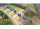 Aerial view of new homes situated on large lots, surrounded by lush greenery at 4017 Mebane Oaks Rd, Mebane, NC 27302