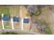 Aerial view showcasing the layout of new homes in a rural setting at 4017 Mebane Oaks Rd, Mebane, NC 27302