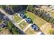 Birds-eye view of the community's homes, displaying the spacious lots and quiet, tree-lined streets at 4037 Mebane Oaks Rd, Mebane, NC 27302