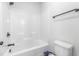 Bright bathroom featuring a white tub-shower combo and modern fixtures, providing a clean and functional space at 4037 Mebane Oaks Rd, Mebane, NC 27302