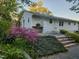 Outdoor patio area with lush landscaping and space for seating at 424 S Greensboro St, Carrboro, NC 27510
