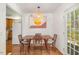 Inviting dining room with hardwood floors and view to the garden at 424 S Greensboro St, Carrboro, NC 27510