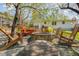 Backyard fire pit area featuring a stone fire pit, seating, and string lights at 424 S Greensboro St, Carrboro, NC 27510