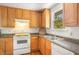 Well-lit kitchen with classic countertops and stainless steel sink at 424 S Greensboro St, Carrboro, NC 27510